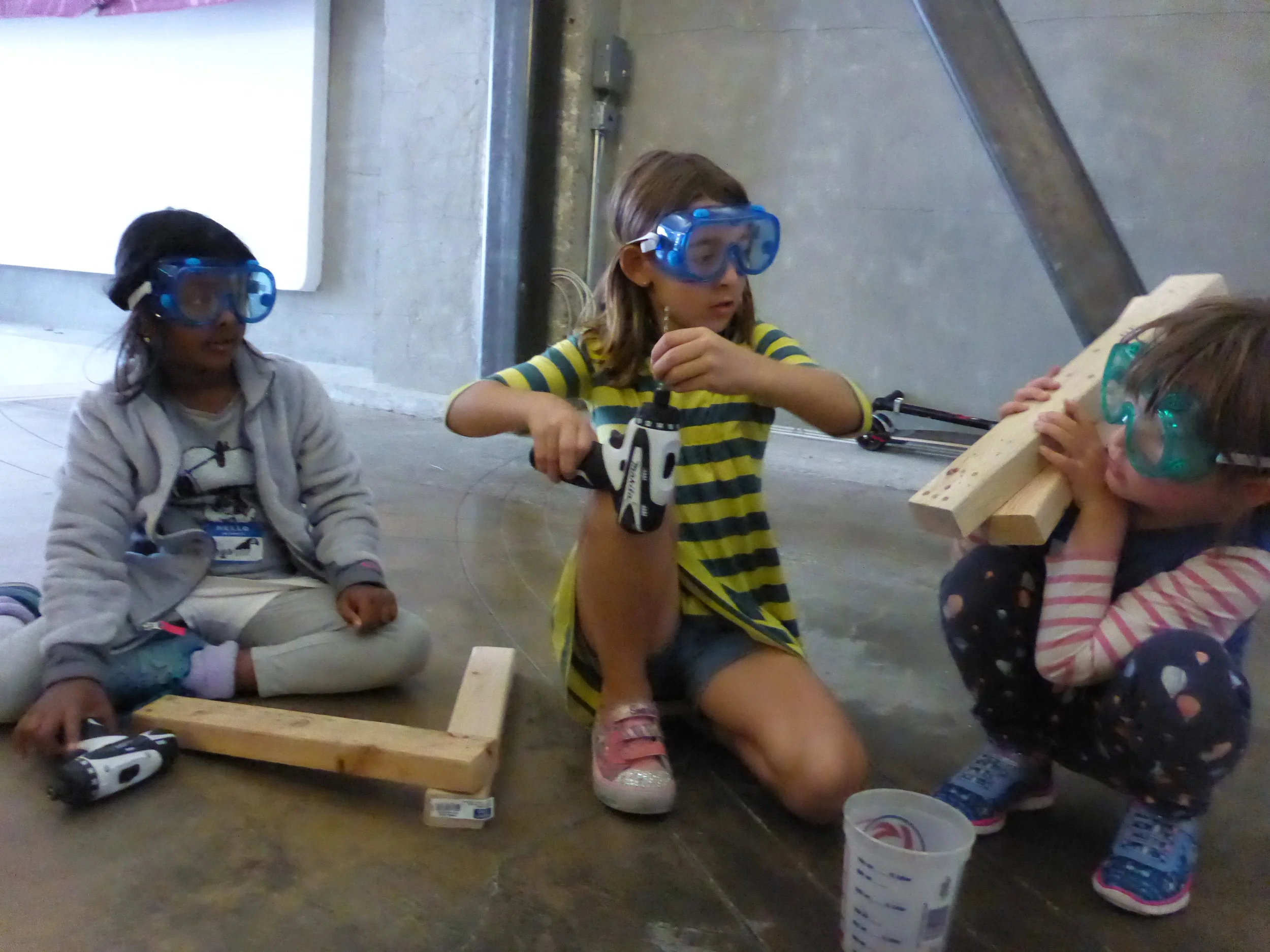 The deer moving leg/joint idea left us with the question, "How do we make wood bend?" Here Anaya, Juliana and Molly try out various ways to make a joint pivot. 