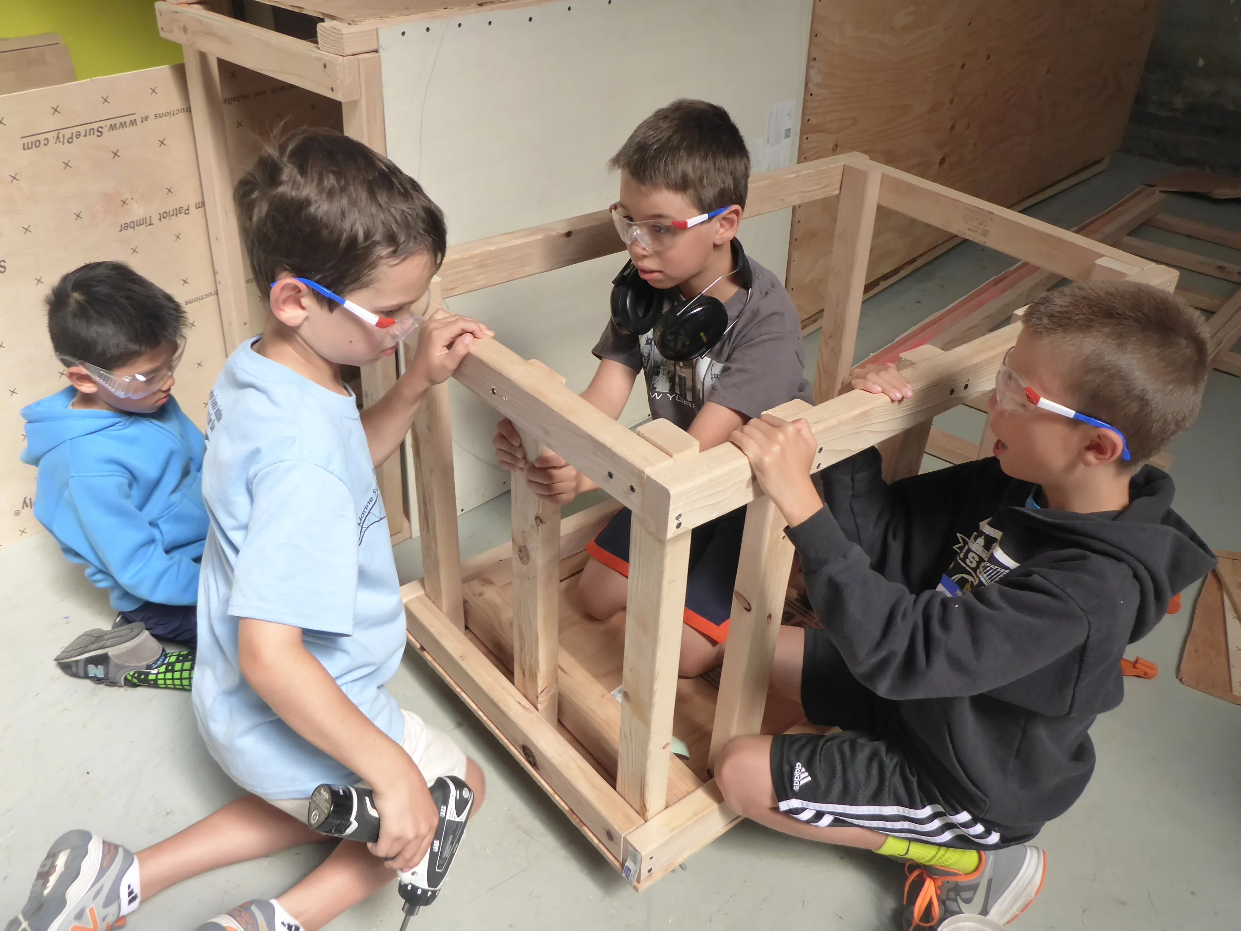 Tinkerers collaborating as they build