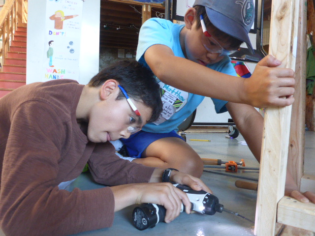 We had some amazing teamwork today! Matthew and Turin worked together to build the base of a ramp. 