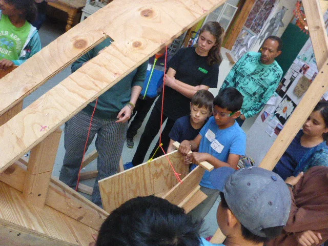 At the end of the session, the whole team came together to try to make the machine vend pencils. (Oh yeah, we decided that for one giant quarter, you could get one pencil. 