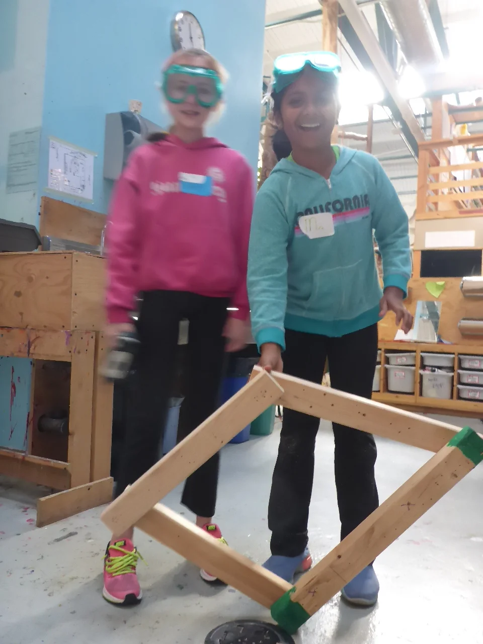 In order to make all these amazing things happen, first we had to learn to use the tools. Piper and Mira show off their shape-shifting parallelogram. 