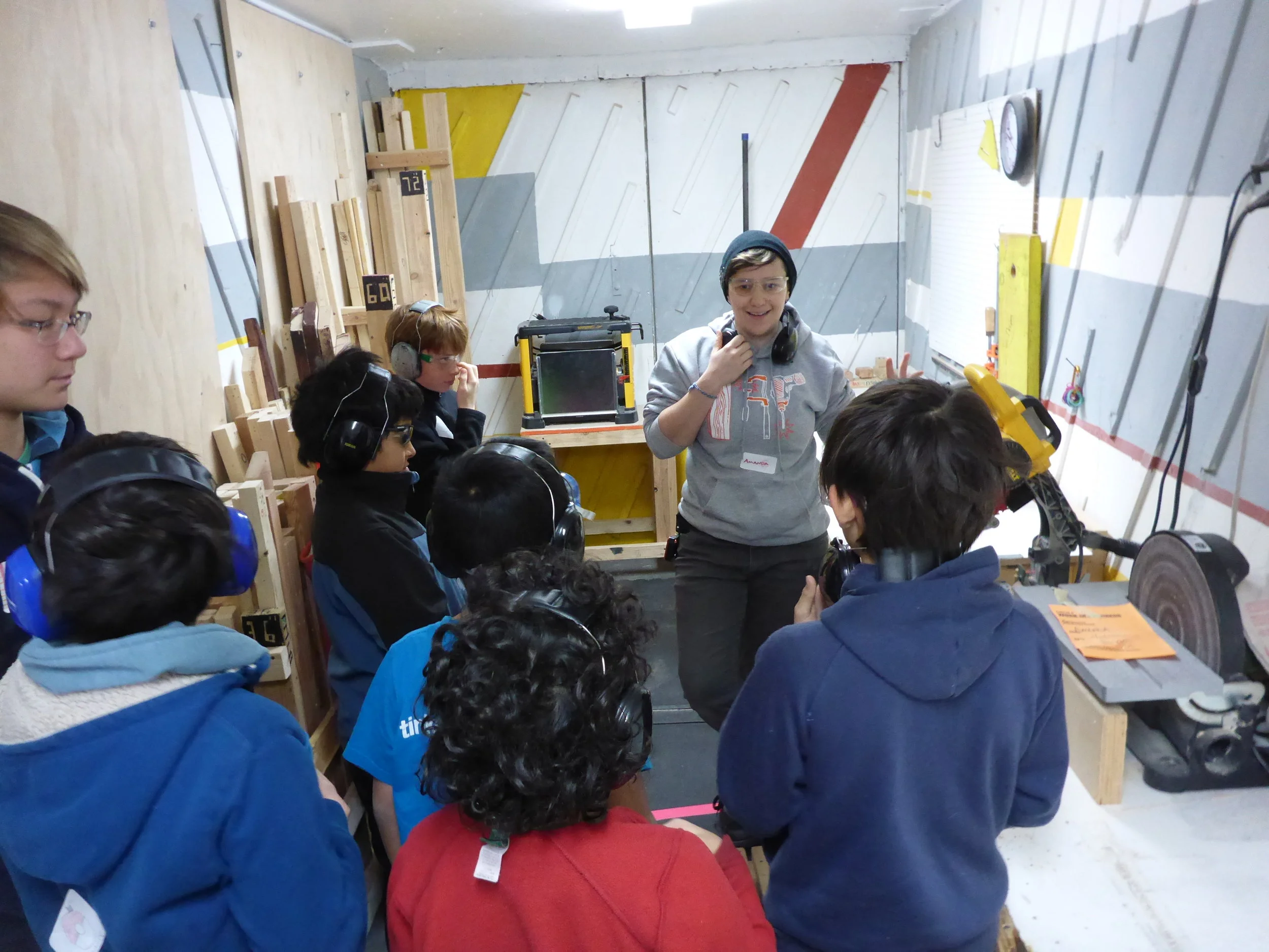 Everyone was trained on how to operate the chopsaw to safely cut wood into pieces. 