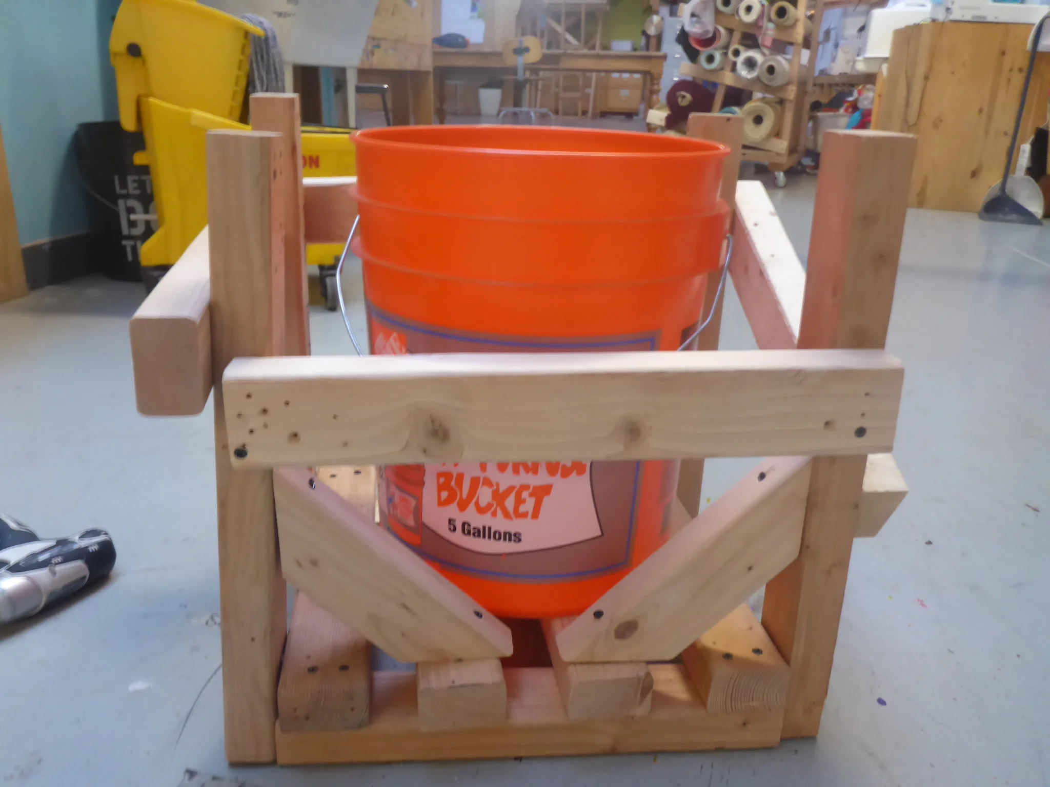 Scarlet worked very hard to make two small angles that fit between the corners. Louis thought it would be fine to do a horizontal beam.