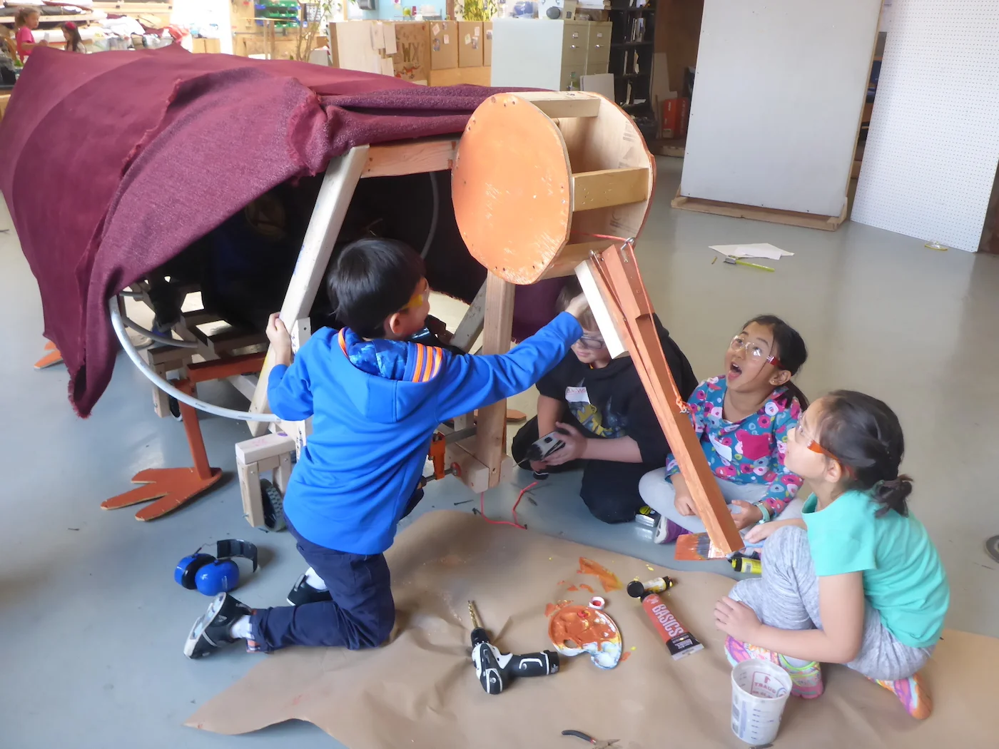 The Kiwi crew attaching the opening and closing mouth