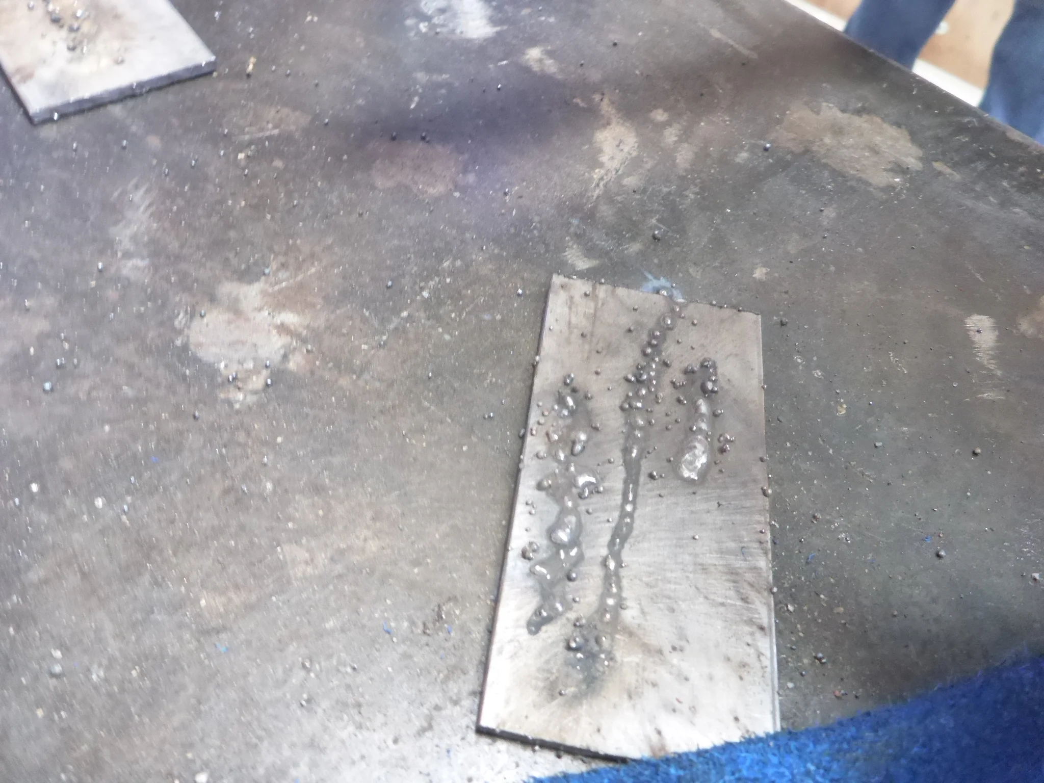 Here we see a weld with zigzags that are too far apart, one that was too fast, and one that was fast then slow!