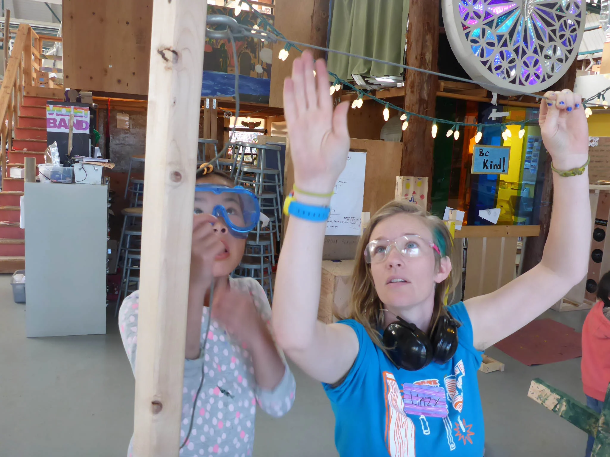 Lillian pulls the Sun-holder rope super tight....until we hear cracking in the towers!
