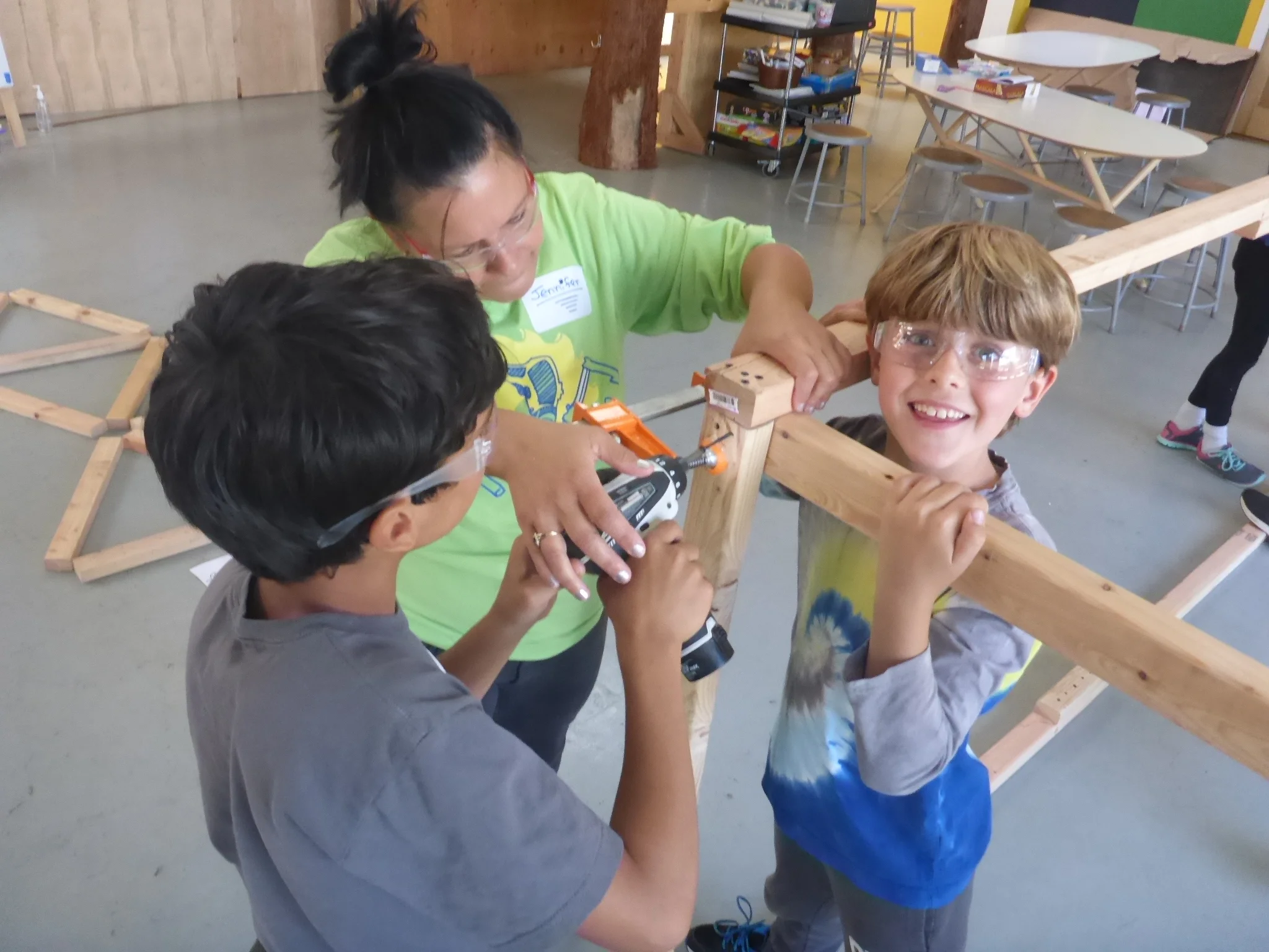 Sometimes a "partner push" on the drill helps. Building is so much fun!
