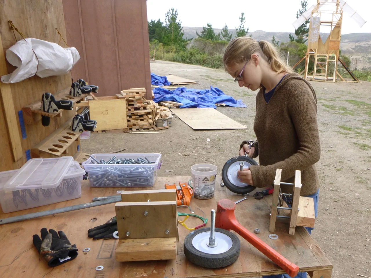 Sofia constructs Team Nooi's steering system.