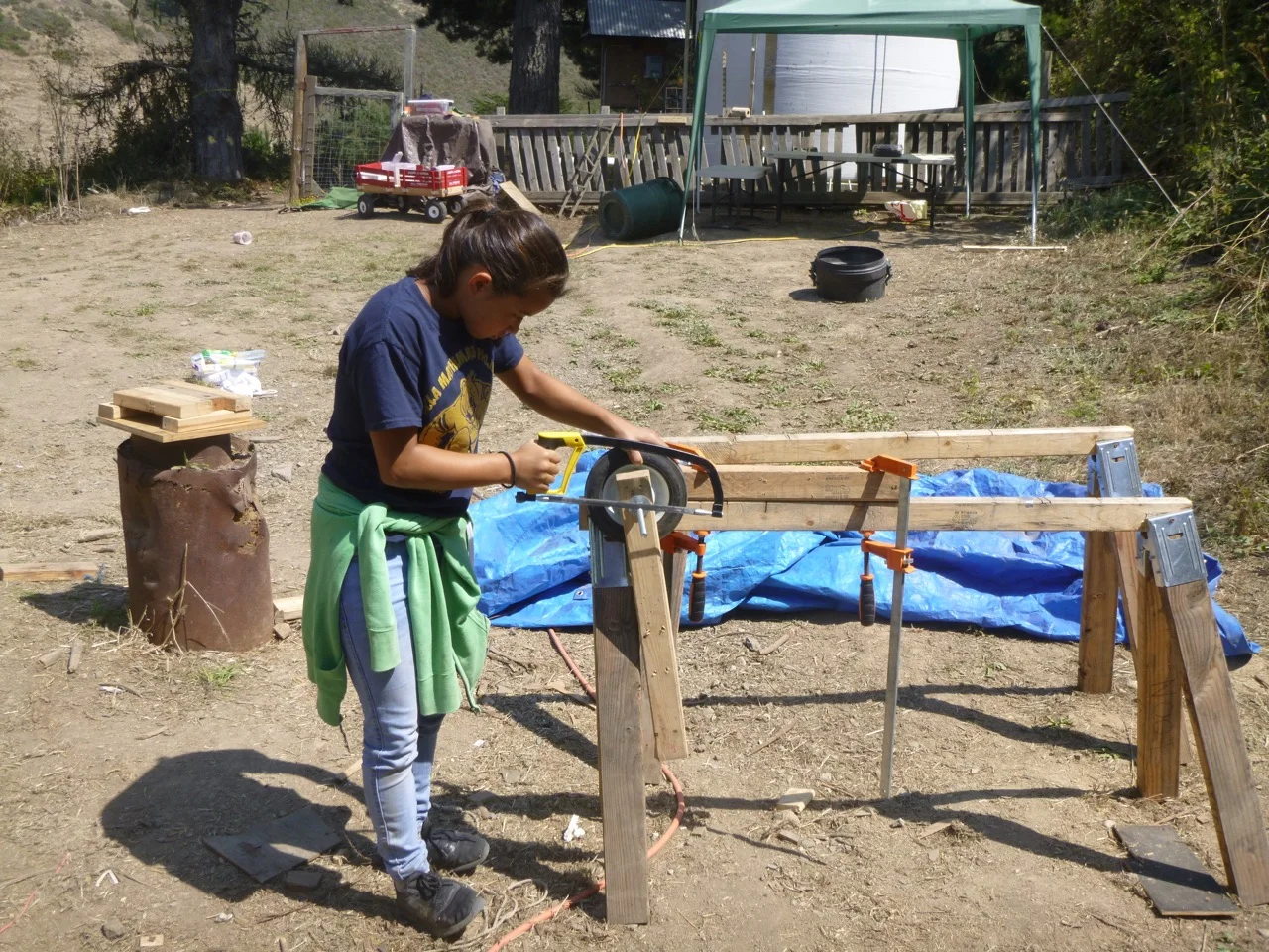 Izzy hacksaws off extra threaded rod.