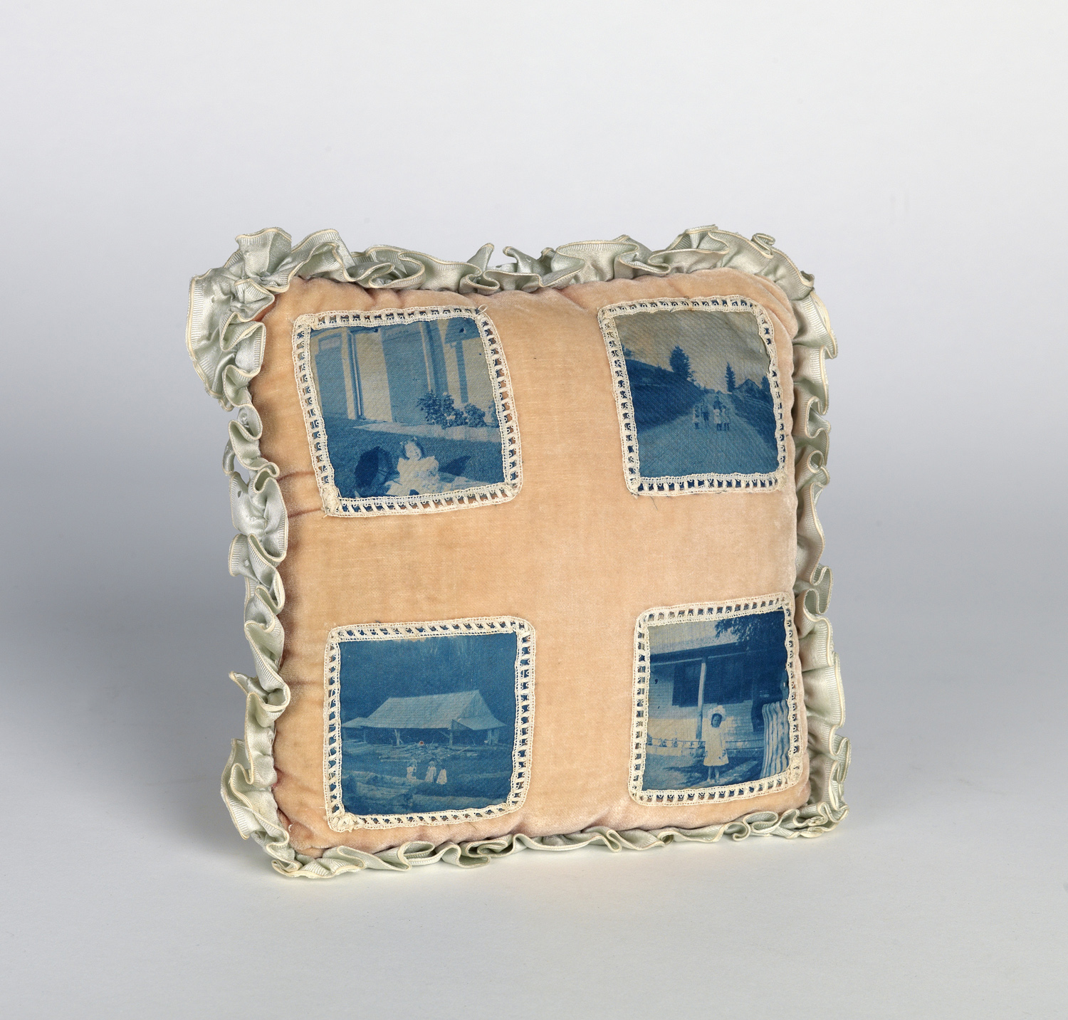    Child's pillow case highlighted with cyanotypes. Circa 1895   