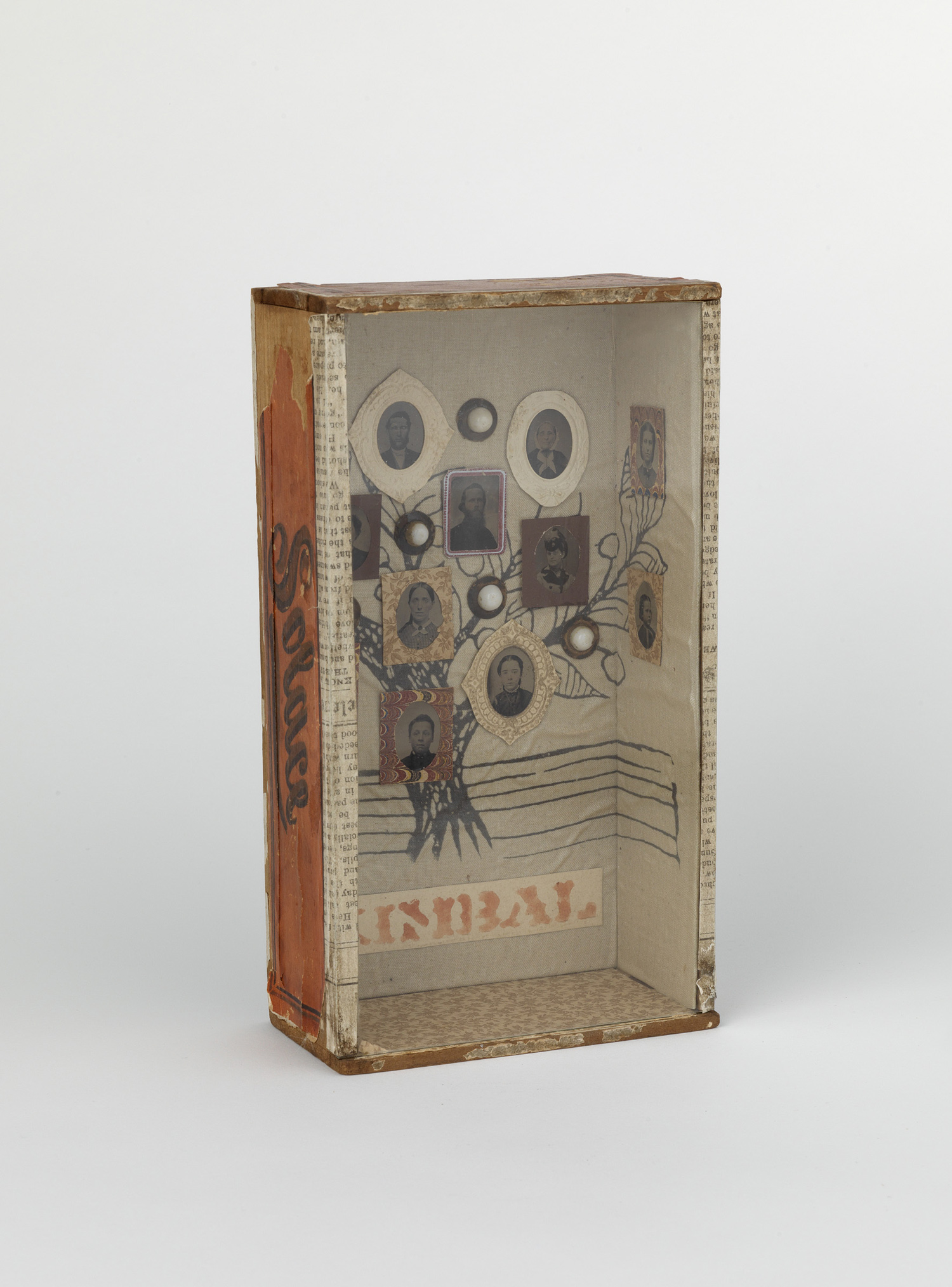    Shadow box with tintypes of the Kimball Family set against contemporary batik fabric.&nbsp; 1880s-1990s   