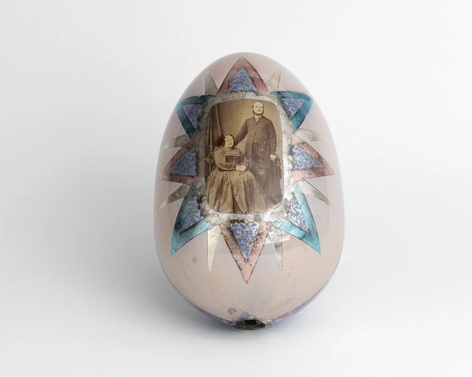 Hand painted glass egg with original photograph of a couple. 1880s
