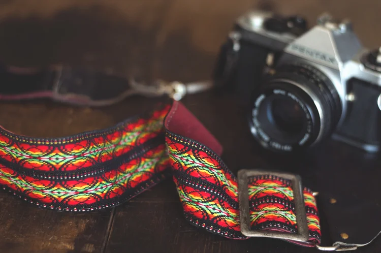 Not only did I score an old camera to screw around with, I also found this woven strap which has already replaced my old one!