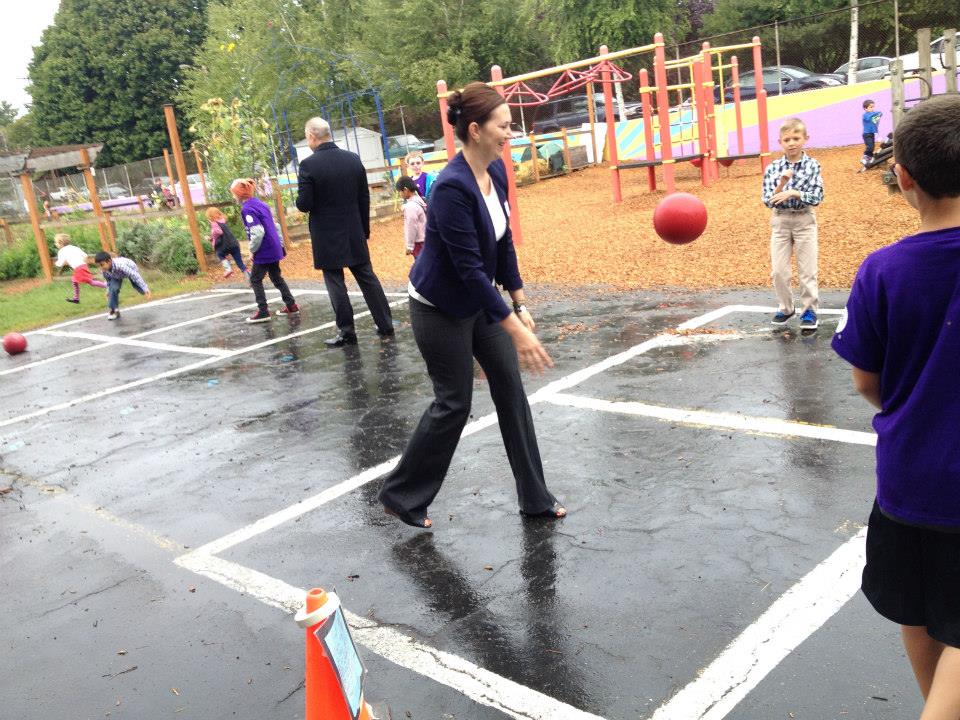 NWHF President Nichole Maher joins Grout Elementary students in a game of foursquare during a Playworks site visit.