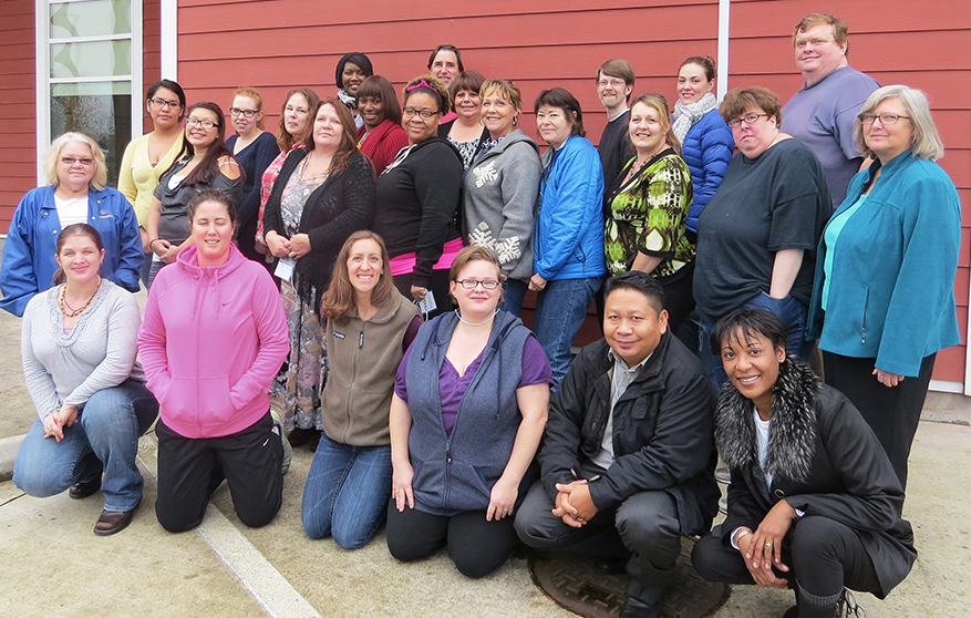 Healthy Living Collaborative's first group of graduating Community Health Workers. Matti is the one in the red sweater.