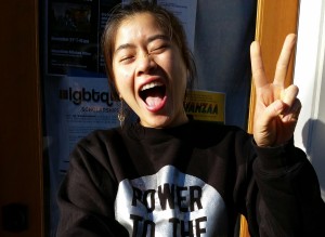 Emily Lai flashing the peace sign. Photo courtesy of Momentum Alliance.