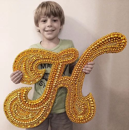 Hen loved Marie's M so much that he requested an H for his room...in his favorite color gold...