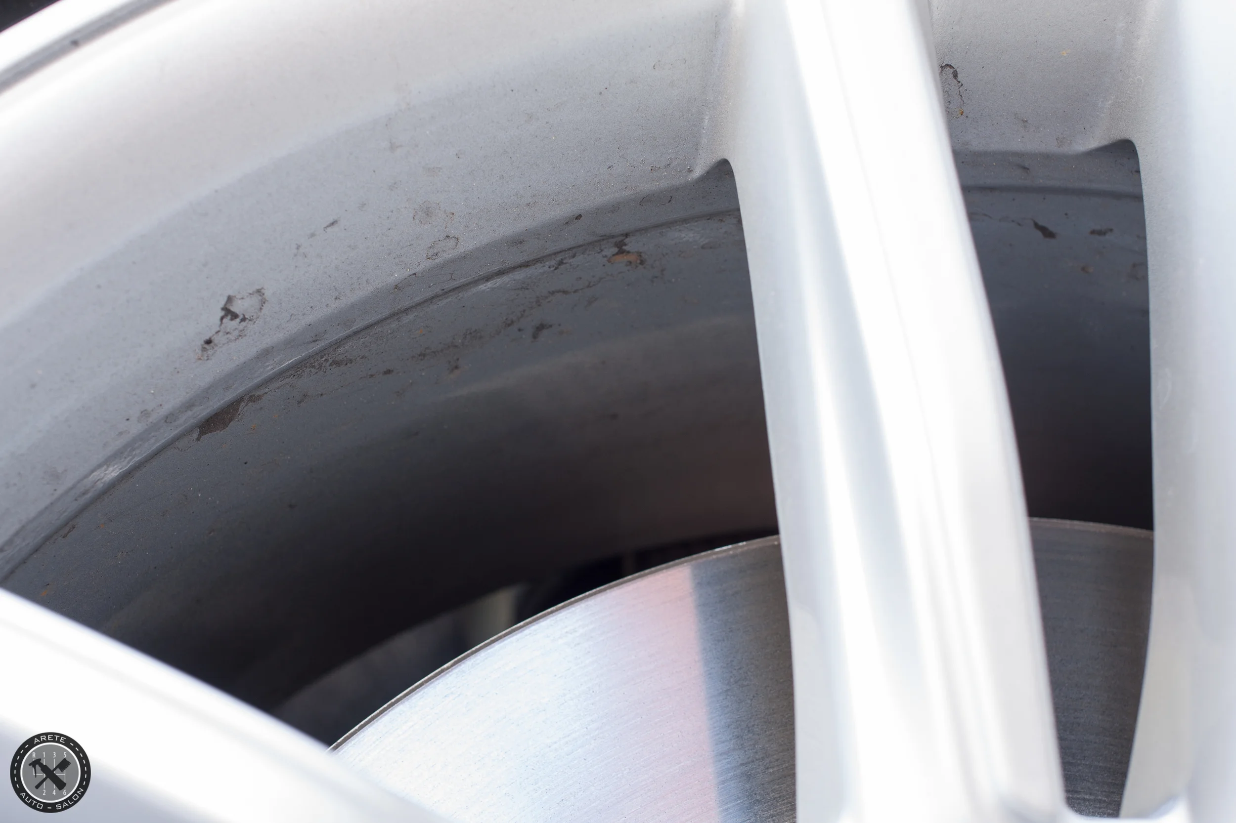 Even though the car had just a handful of miles the wheels managed to pick up some tar and grime.
