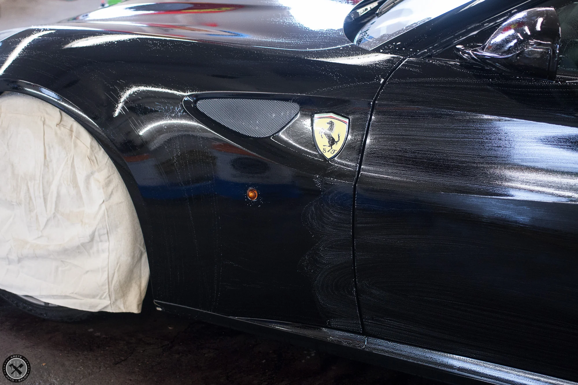 Decontamination in progress. Removing environmental contamination is critical to properly preparing a paint surface for correction and film application. It assists in creating the best possible adhesion for film and bond for CQuartz Finest. 
