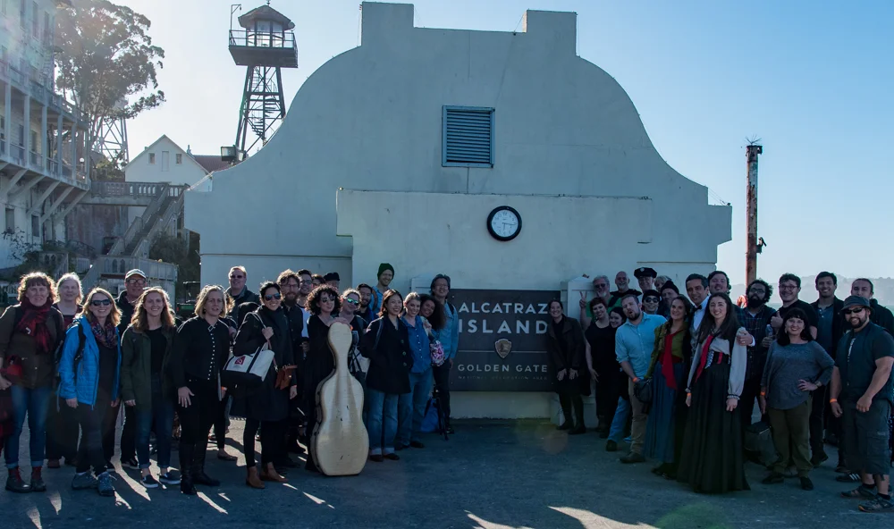 The cast and crew of Vireo at the dock on Alcatraz, ready to begin work.