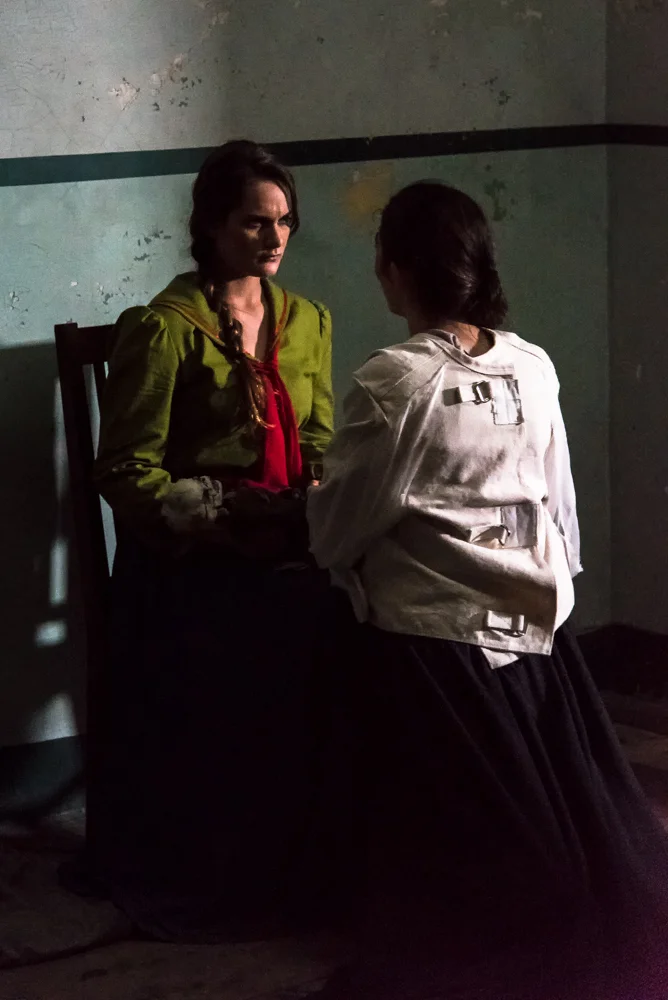 Vireo (Rowen Sabala, left) and her "mysterious twin Caroline" (Emma MacKenzie).