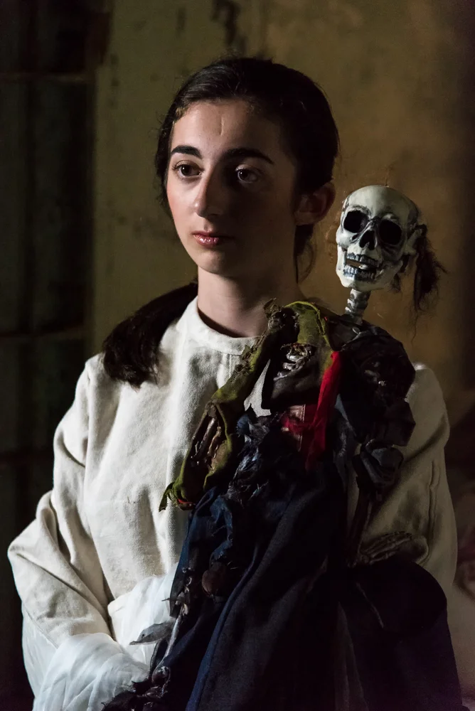 Emma MacKenzie (Caroline) between takes, awaiting her entrance.