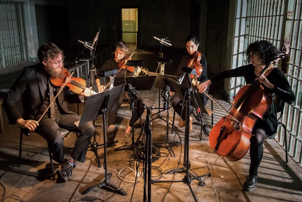 Members of the American Contemporary Music Ensemble in the Alcatraz hospital.