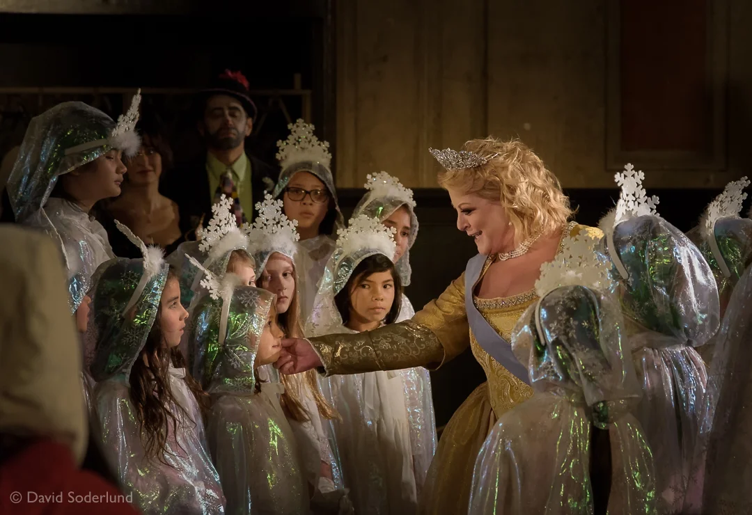 The "Queen of Sweden" (Deborah Voigt) among the snowflakes (San Francisco Girls Chorus).
