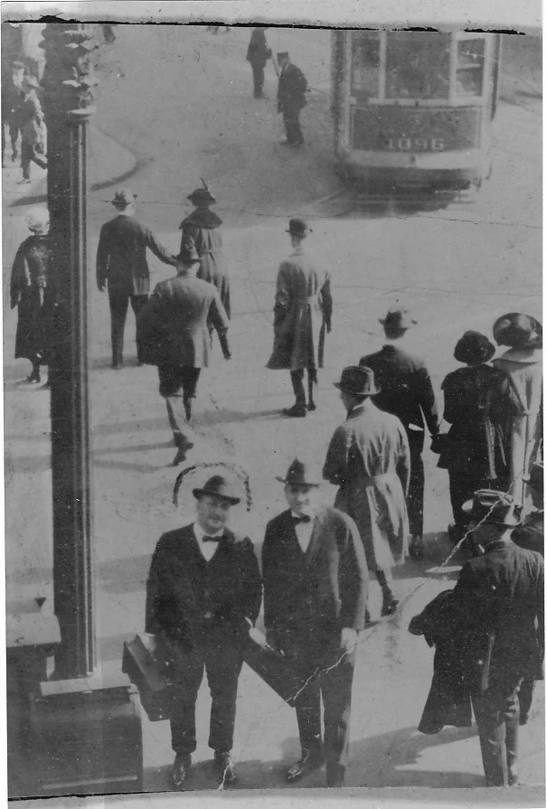 Giuseppe Alessi (circled), either going to or coming from a gig
