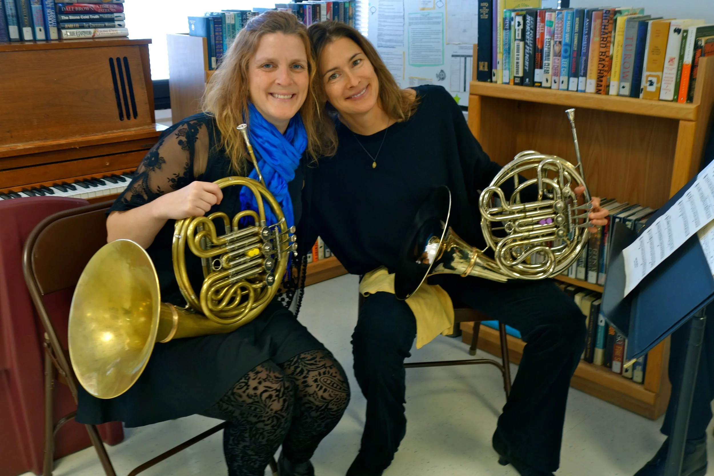 Barbara Jöstlein Currie and Anne Scharer before the brass performance.