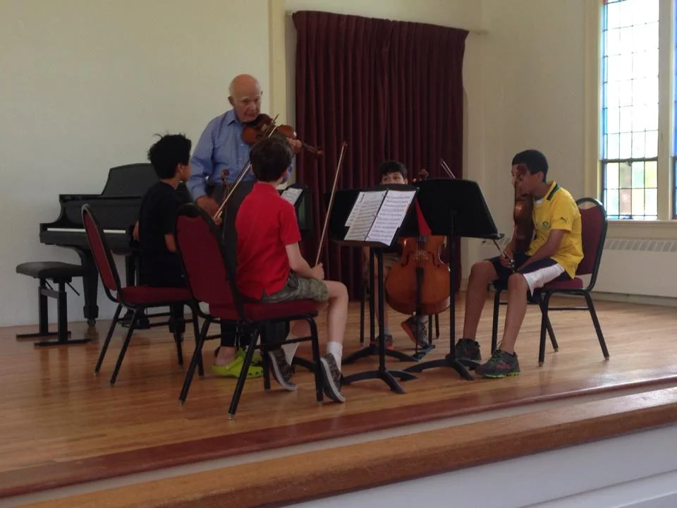 Former Boston Symphony Concertmaster Joseph Silverstein coaching Berkshire Summer Music students