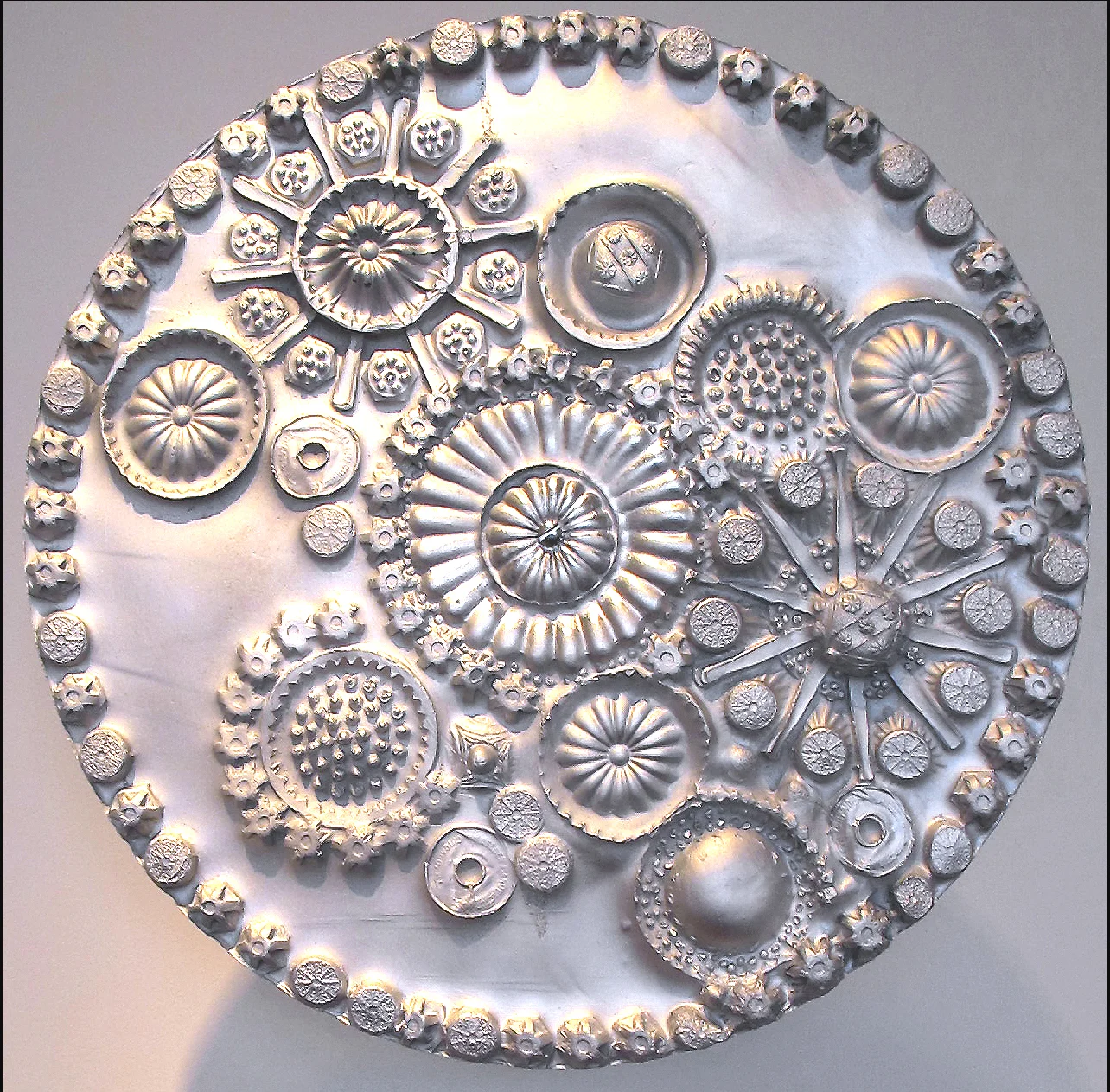 Fete des Cellules, detail, cast plaster, 26"x26"x1"