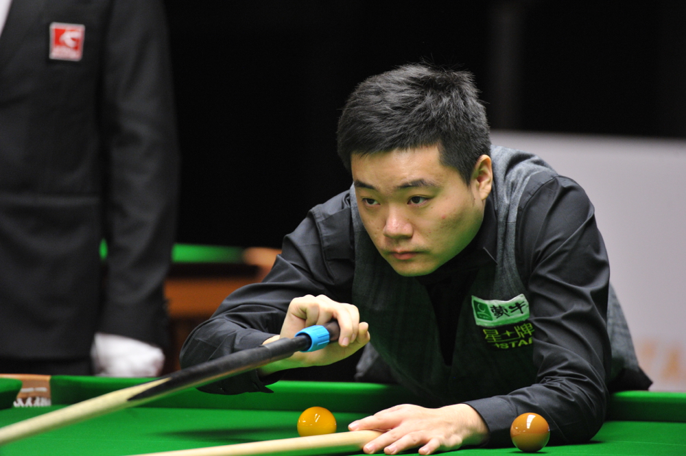 DING AND TRUMP INTO QUARTER-FINALS