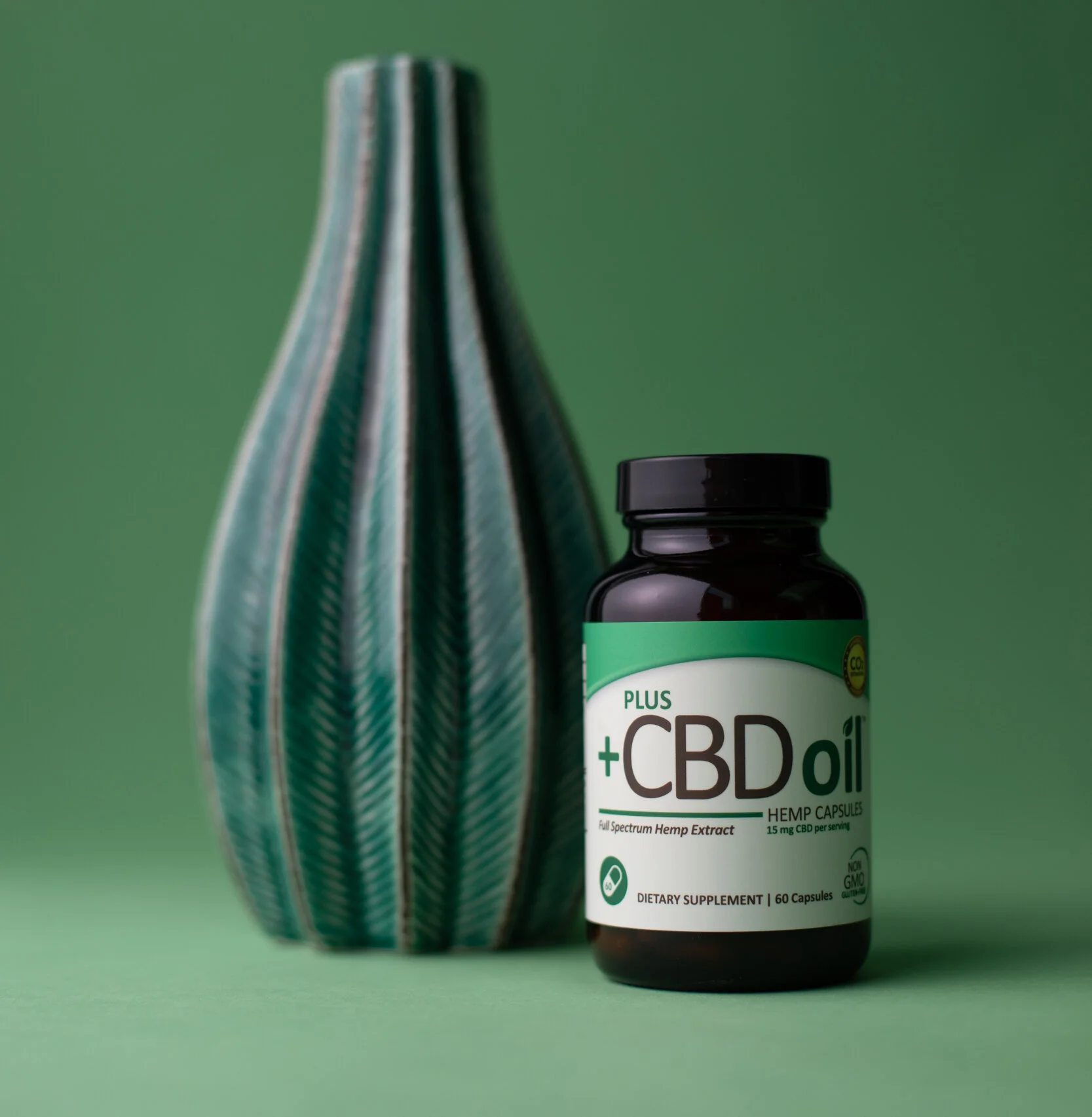 PlusCBD_Oil_Green_Capsules_Minimal_Green_Vase-2-9190x-2.jpg