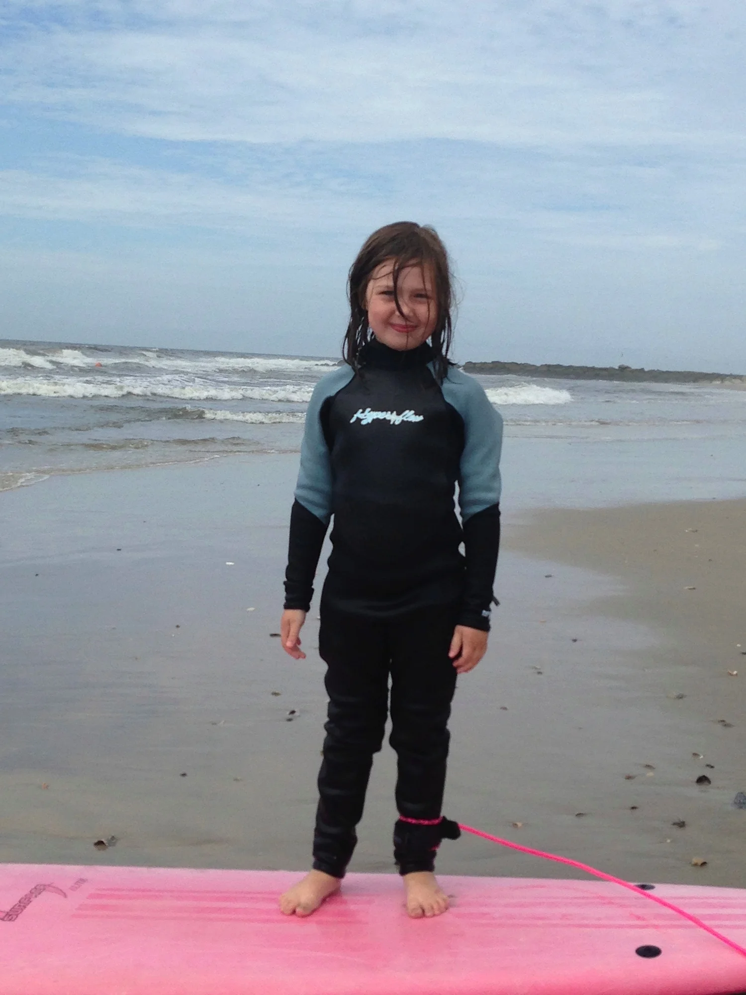 Image of young girl, 2013 Surf2Live, Long Beach, NY Summer Surf Camp.