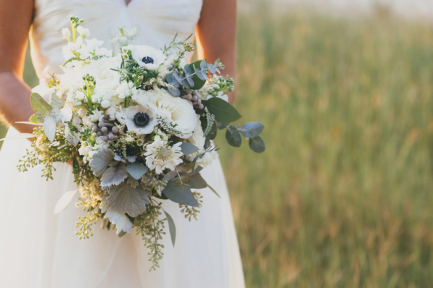  Bohemian style, wildflower inspired bridal and bridesmaid bouquets with eucalyptus, white anemone, ranunculus at Vista West Ranch. Petal Pushers floral event design studio located in Dripping Springs, Texas. 