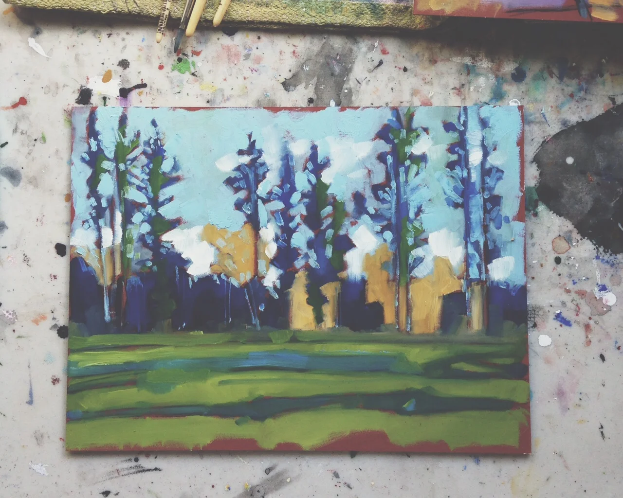 long shadows, tall pines, Whitehorse YT, oil on masonite, 9x12, 2015