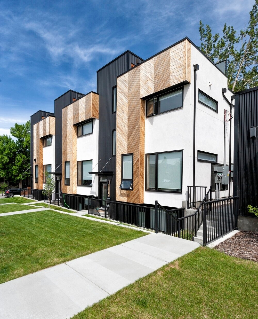 West Hillhurst 3/3 is a three unit plus three suite rowhouse building designed for RNDSQR in Calgary&rsquo;s West Hillhurst neighbourhood.⁠
⁠
The site was unusually narrow for the neighbourhood. A typical parcel at 15.24m wide would normally fit four