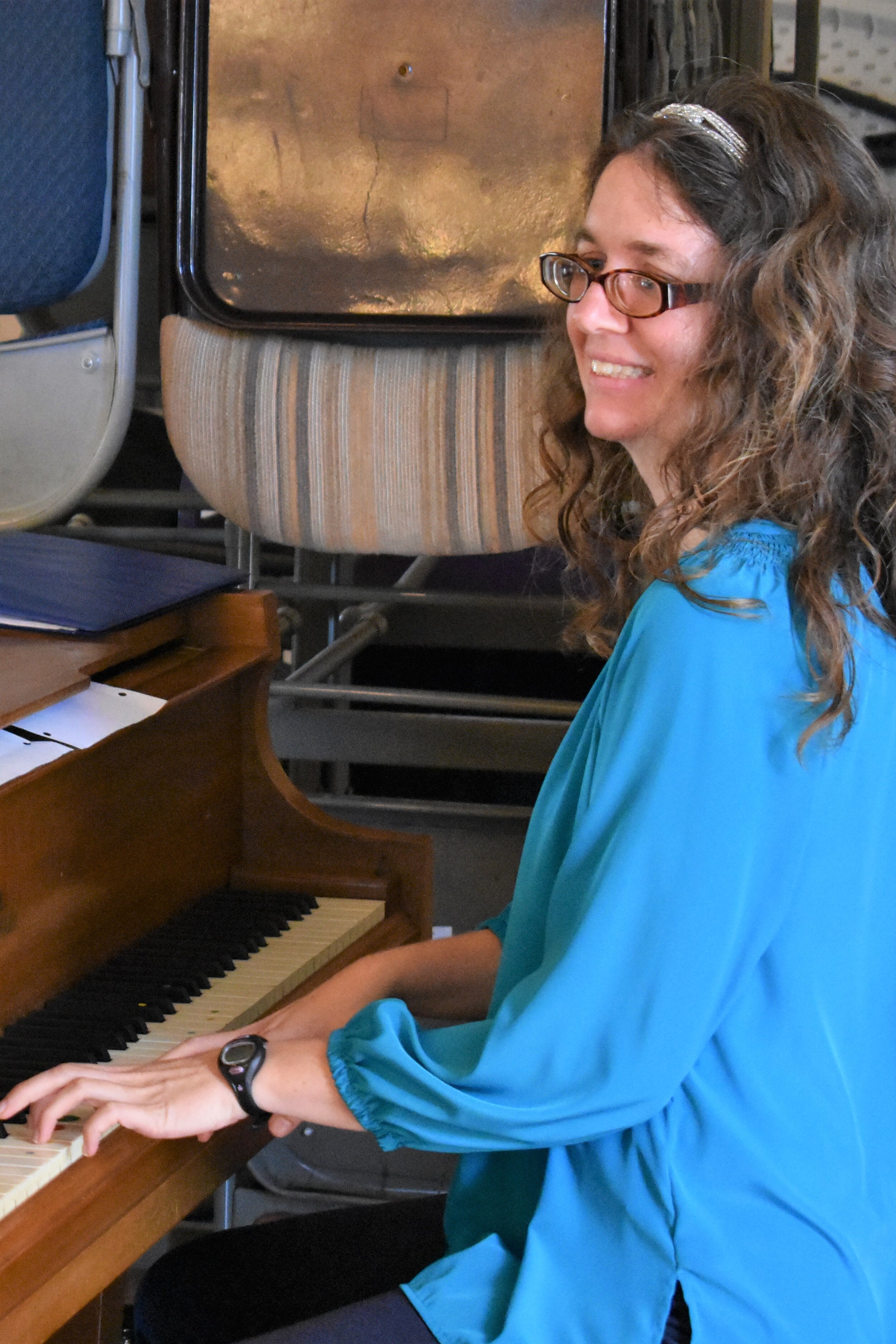  A participant showing her musical talent on the piano.  