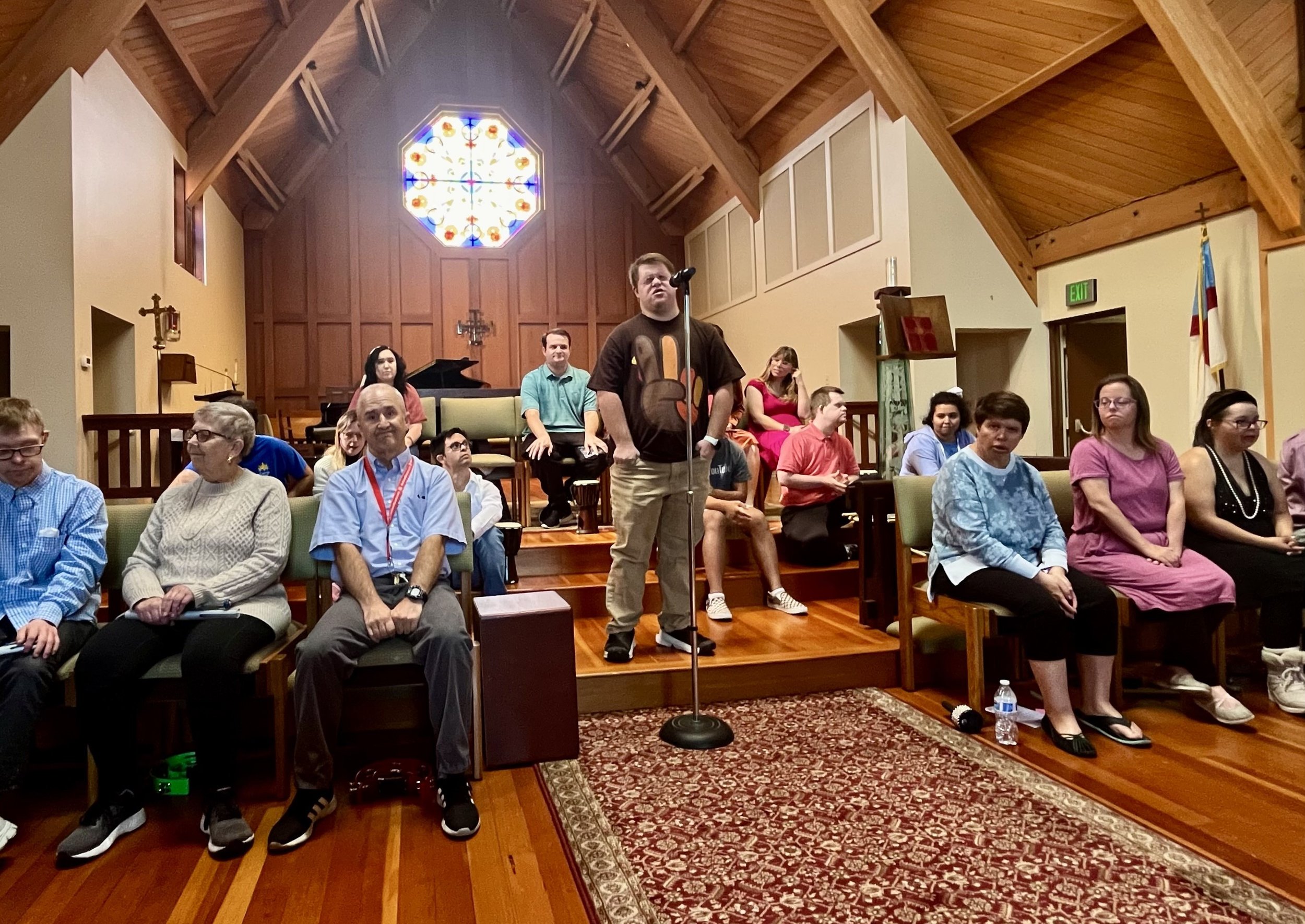  Laguna Beach participants singing, dancing, and performing at their 2023 Fall Recital and Art Boutique, in the St. Mary’s sanctuary hall. 