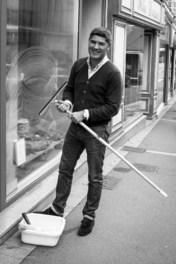 A man tidying his shop in Bayeux, France, was a great subject for an early morning portrait.