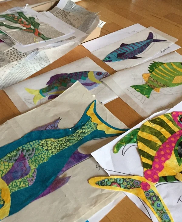 Some of the applique fish coming together.