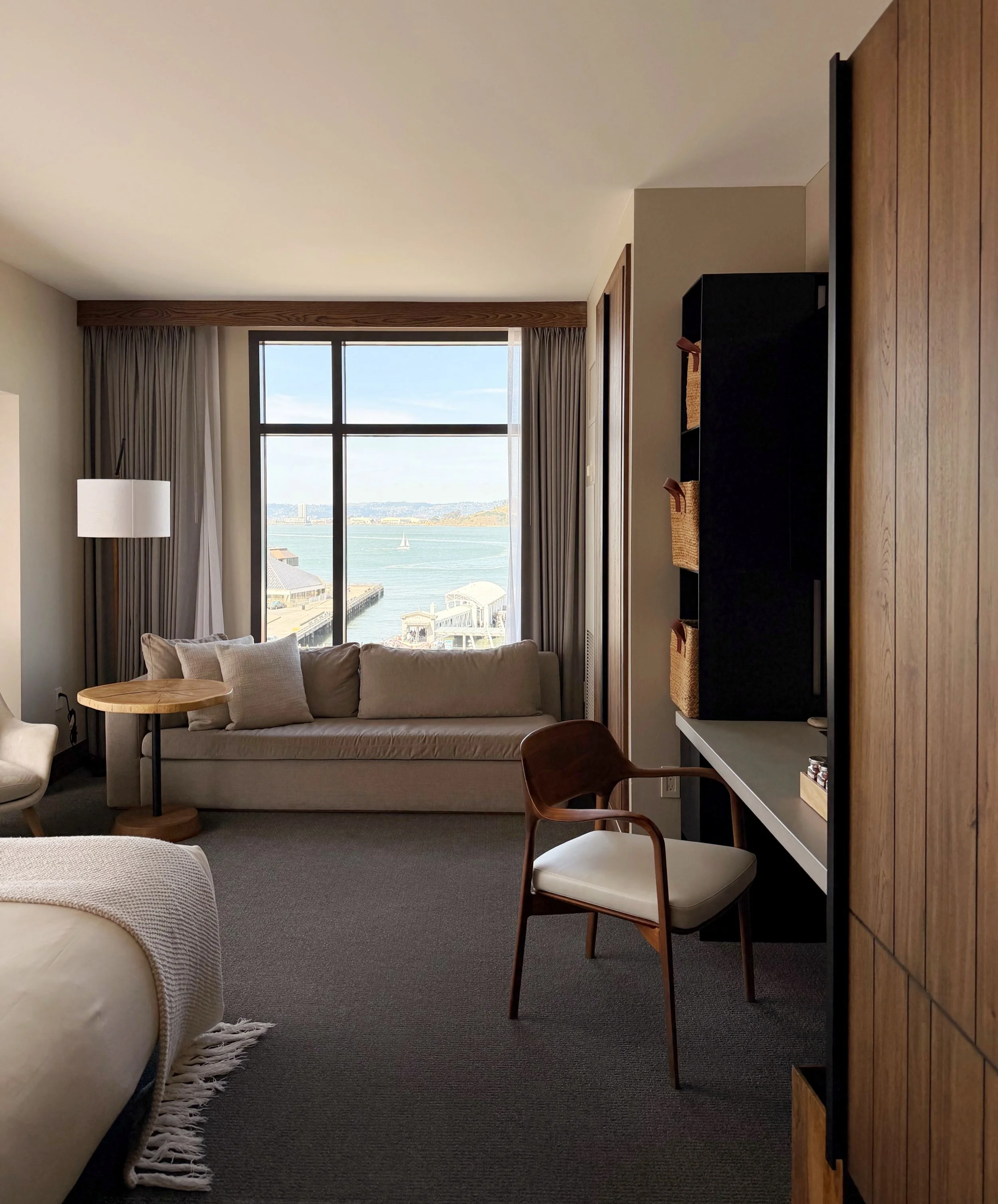 A calming corner suite with waterfront views for days.