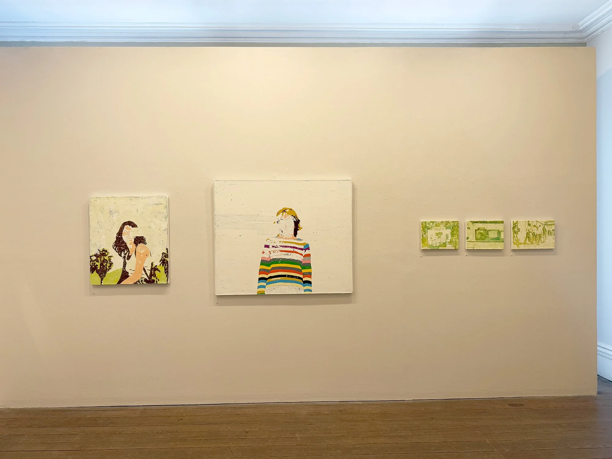 Gallery wall with five paintings, three small green-toned images on the right and two larger portraits in the middle, against a cream wall in an art gallery.