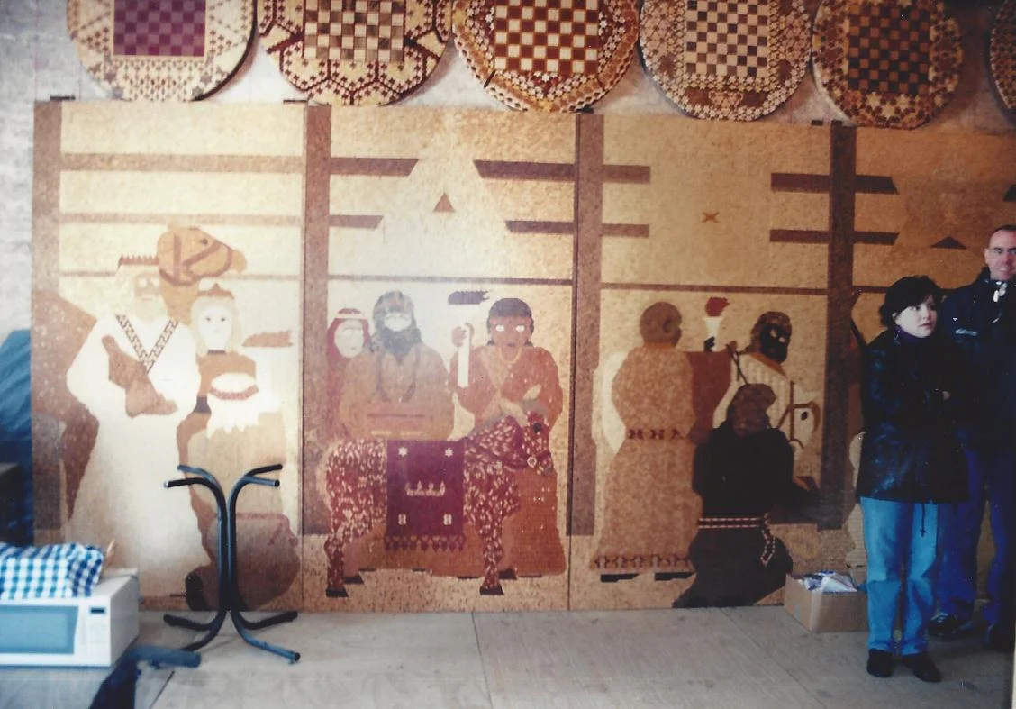 Manger with Mosaic Tables above