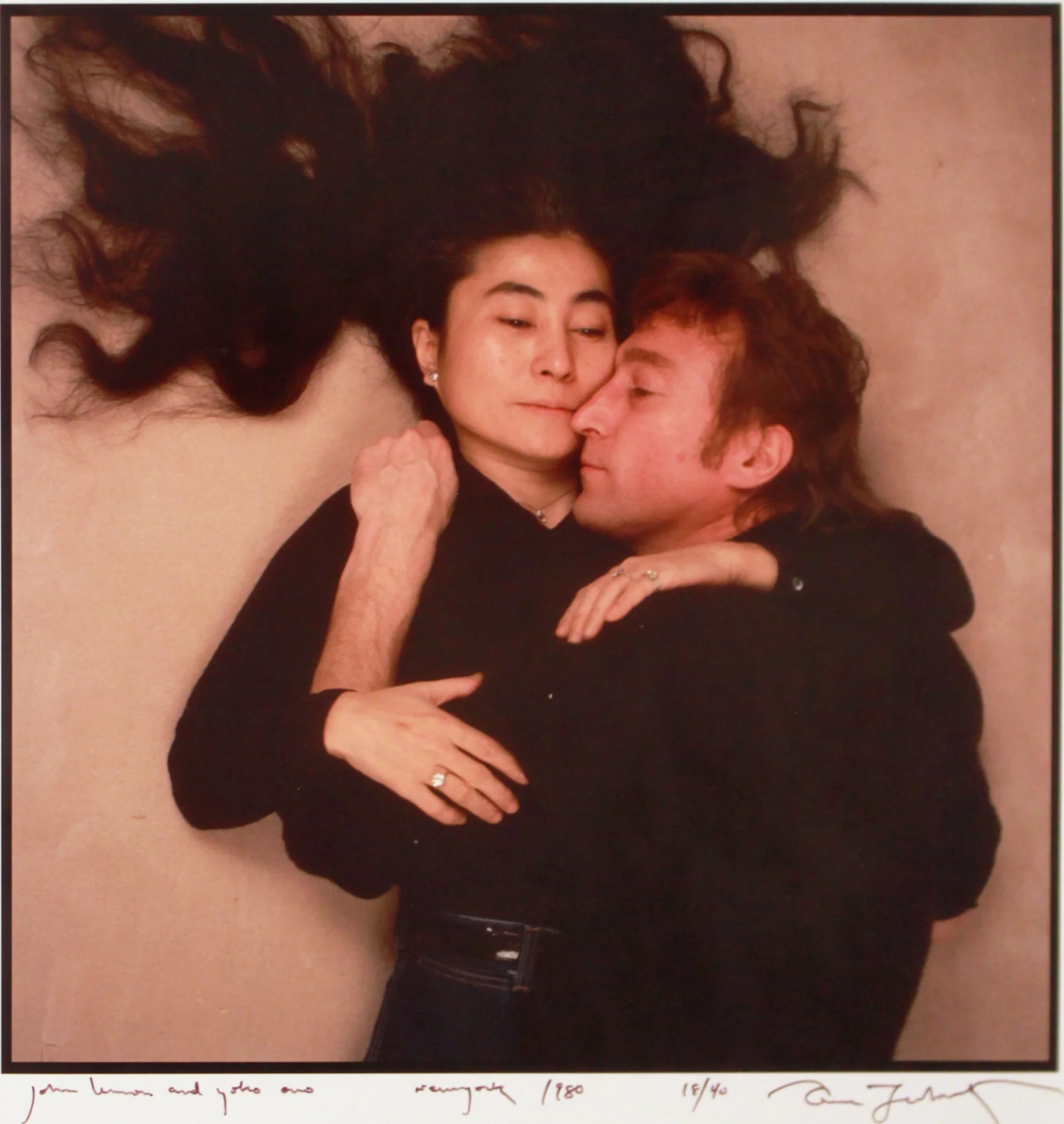 Annie Leibovitz John Lennon & Yoko Ono (Clothed) , 1980 Cibachrome print From the numbered edition of 40 Signed, numbered, titled and dated in ink on recto Image: 12.25 x 12.25 inches; Sheet: 20 x 15.75 inches; Framed: 22 x 20 inches Provenance: Timothy D. Kehr Gallery, Minnesota, tag on verso