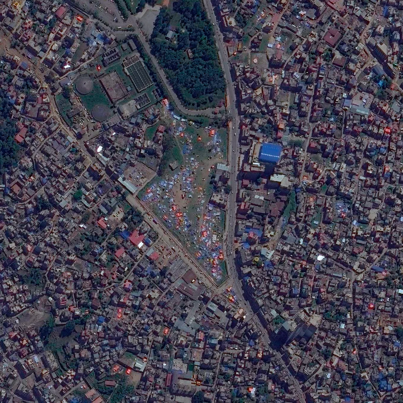 4/27/2015 Outdoor shelters in Tara Goan Park Kathmandu, Nepal 27.720216000°, 85.352543000° As many of you know, a powerful earthquake struck the country of Nepal this past Saturday. Due to tremendous damage and fear of aftershocks, many people have moved to open spaces outdoors. Satellite images taken in recent days over the city of Kathmandu show a number of these shelters appearing across the city - like the ones seen in this Overview of Tara Goan Park. To donate to Red Cross relief efforts, click here . Our thoughts are with the people of Nepal during this difficult time.