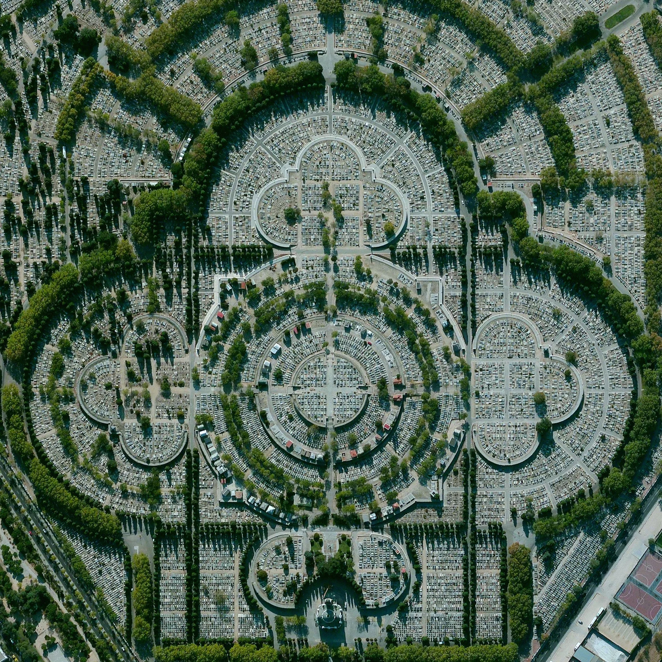 7/16/2015 Our Lady of Almudena Cemetery Madrid, Spain 40°25′10″N 3°38′26″W Our Lady of Almudena Cemetery in Madrid, Spain is one of the largest cemeteries in the world. The number of gravesites - estimated at five million - is greater than the population of Madrid itself.