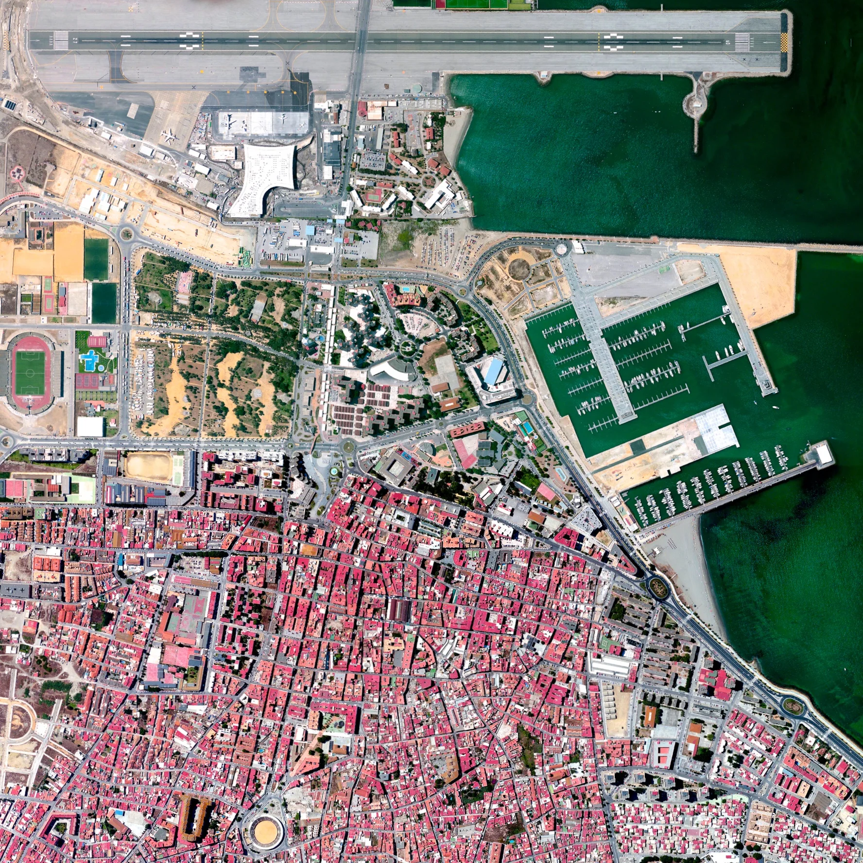 7/27/2015 Gibraltar International Airport Gibraltar 36°09′04″N 005°20′59″W Check out this zoomed-in look at one of the prints that was added to our store yesterday. The Overview captures the Gibraltar International Airport, serving the British overseas territory and neighboring areas of southern Spain. Winston Churchill Avenue - the road to the border with Spain - intersects the airport runway and has to be closed every time a plane lands or departs. To see what else is in the Printshop, click here !