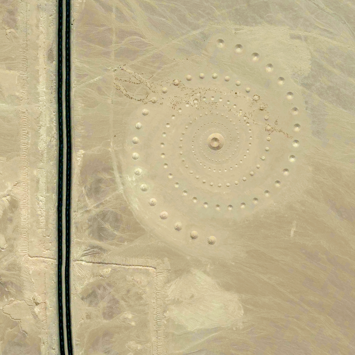 8/8/2015 Desert Breath Hurghada, Egypt 27.380541787°, 33.634132451° “Desert Breath” - located in the Egyptian desert near Hurghada on the Red Sea - is a double-spiral art piece. Because the 89 protruding cones that make up one spiral are constructed from the sand that was dug to create the 89 depressed cones of the other spiral, in due time, with erosion, the area of approximately one million square feet will revert back to its original state.